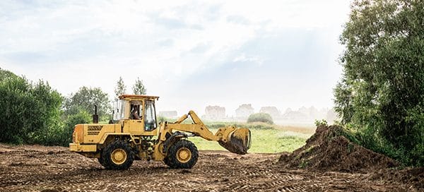 clearing land with a front end loader